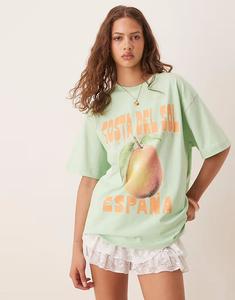 Футболка свободного кроя ASOS DESIGN зеленого цвета с принтом Costa del Sol