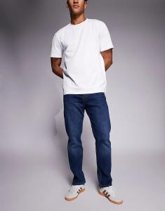 Зауженные джинсы Levi's 502 средне-синего цвета