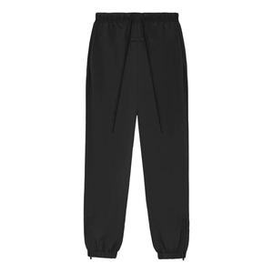 Брюки ss24 nylon track pant 'jet black' Fear Of God Essentials, черный