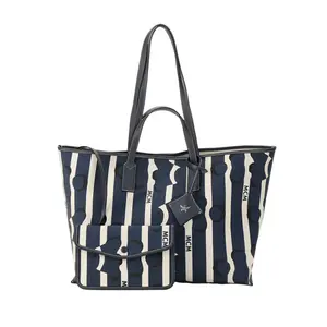 MCM Печатная холщовая сумка с кожаной вставкой