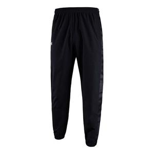 Брюки quick snap tearaway sweatpants 'black' Under Armour, черный