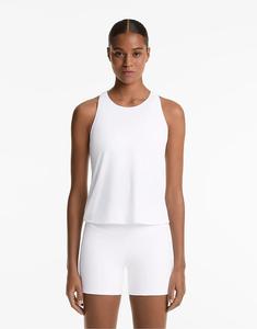 Футболка Comfortlux с перекрестной спинкой Oysho белого цвета