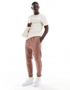 Спортивные штаны с этикеткой в коричневом цвете Hera