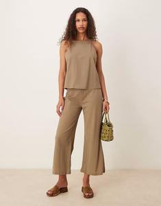 Комбинированные брюки из смеси льна с эластичной талией и широкими штанинами бежевого цвета Mango