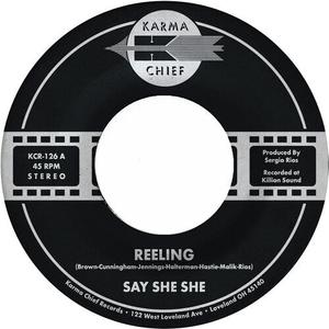 Сингл 7" Say She She: Reeling / Don't You Dare Stop