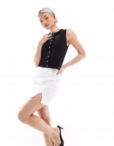 Рассказываемая мини-юбка А-силуэта в текстурированном бежевом цвете Narrated