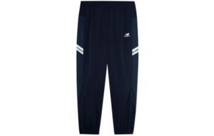 Трикотажные спортивные штаны унисекс темно-синие New Balance, темно-синий