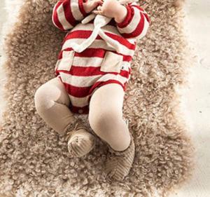 Детский полосатый вязаный комбинезон Babys Stipey в красно-разноцветном цвете Petit Indi