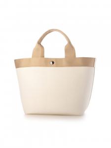 Cachecache / Двусторонняя сумка-тоут в форме лодки, упакованная в термоусадочную пленку.