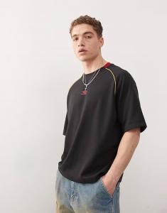 Футболка с сетчатыми вставками черного цвета Umbro