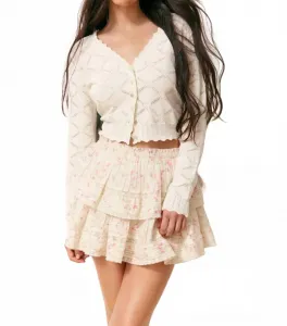 Мини-юбка с оборками цвета магнолии Loveshackfancy