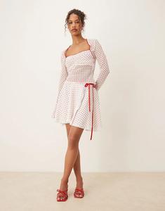 Мини-юбка с оборками и завязкой от Тайлера Макгилливари в белом и красном цветах