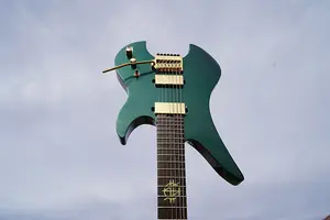 Schecter DIAMOND SERIES Synyster Gates Custom-7 TR безголовая 7-струнная электрогитара - Металлик дубовый зеленый (2024)