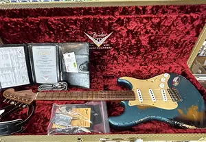 Fender Custom Shop Limited Edition ‘54 Stratocaster Super Heavy Relic - состаренный океанский бирюзовый с двухцветным санберстом / 7 фунтов 9,6 унций № LXX0040