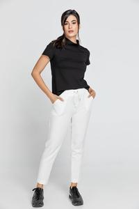 Креповые брюки цвета экрю от Conquista, экрю