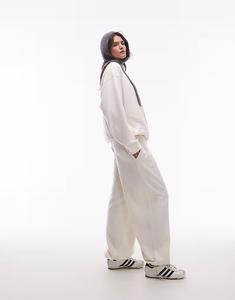 Брюки-джоггеры с начесом и манжетами кремового цвета Topshop