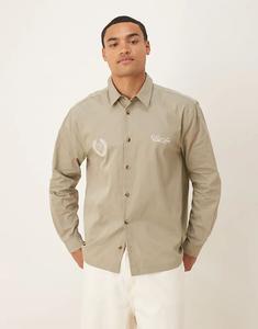 Свободная рубашка ASOS DESIGN с вышивкой на груди цвета хаки