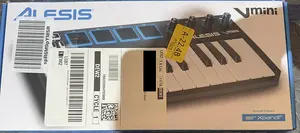 Alesis V-Mini - 25-клавишный USB MIDI-контроллер с 4 подсвечиваемыми чувствительными пэдами, 4 настраиваемыми энкодерами и профессиональным программным обеспечением -