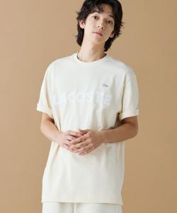 Футболка с коротким рукавом из плотной ткани с резиновым принтом и логотипом известного бренда.