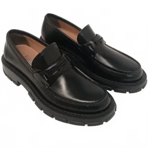 Женские кожаные лоферы с тисненым логотипом, черные Salvatore Ferragamo