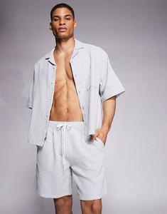 Шорты средней длины от ASOS DESIGN из синей и белой вафельной ткани