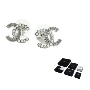 CHANEL Серебряные металлические серьги для женщин