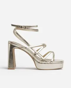 Женские босоножки на высоком каблуке с платформой золотого цвета Mim