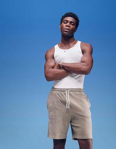 Короткие шорты свободного кроя из ребристого велюра ASOS DESIGN бежевого цвета