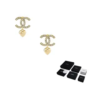 CHANEL Золотые металлические серьги для женщин Gold