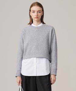 Мягкая моющаяся пряжа из смеси кашемира и люрекса, связанная узлом.