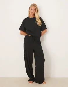 Черные хлопковые пижамные брюки смешанного цвета ASOS DESIGN