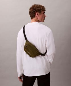 (M) Поясная сумка Calvin Klein с крупным логотипом. Аксессуар для джинсов Calvin Klein 4D3116G