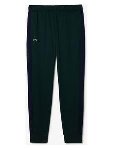 Темно-зеленые спортивные штаны Lacoste