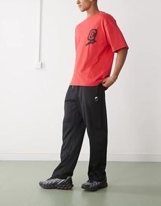 Брюки Nike Air плетеные черного цвета