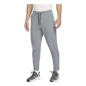 Брюки dri fit с застежкой-молнией на манжете универсальные брюки Nike, серый