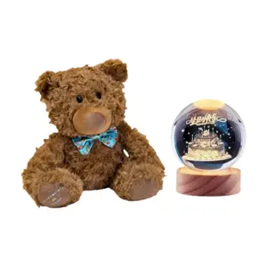 Плюшевый мишка с бантом, высота 23 см Dolls and bears dance