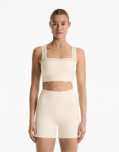 Майка-борцовка Oysho Compressive цвета бледно-бежевого