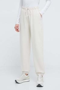 Хлопковые спортивные штаны New Balance, бежевый