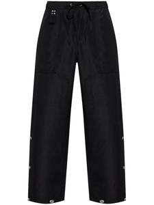 Брюки Comme des Garçons Homme Plus с декоративными пуговицами, черный