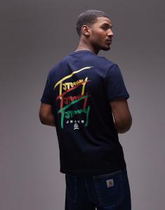 Футболка Tommy Jeans с повторяющимся фирменным принтом на спине белого цвета