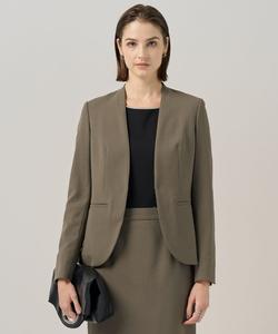 Шерстяная куртка без воротника, эластичная в двух направлениях.