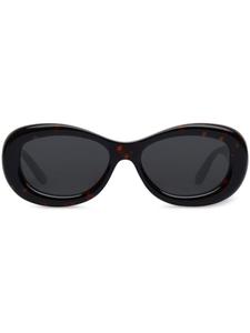 Courrèges солнцезащитные очки Reve в овальной оправе, коричневый