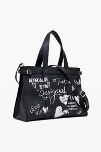 Сумка-шоппер из искусственной кожи с принтом в виде граффити, выполненным вручную, черного цвета.