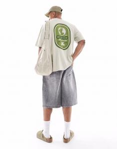 Футболка свободного кроя ASOS DESIGN бежевого цвета со спортивной графикой