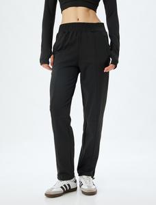 Брюки зауженного кроя Koton, черный