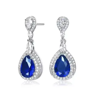 Ослепительные серьги-подвески с родиевым покрытием в форме двойного ореола с прозрачными грушевидными камнями, камнями огранки «маркиз» и круглыми кубическими цирконами Rachel Glauber, blue
