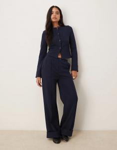 Спортивные брюки ASOS DESIGN из интерлока с отворотом на подоле темно-синего цвета