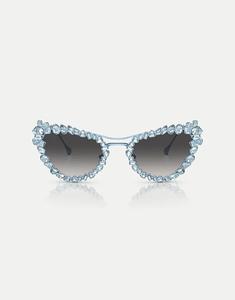 Солнцезащитные очки Swarovski Sk7011 необычной формы с серыми линзами матового светло-голубого цвета