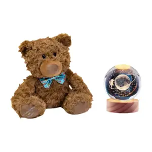 Плюшевый мишка с бантом, высота 23 см Dolls and bears dance