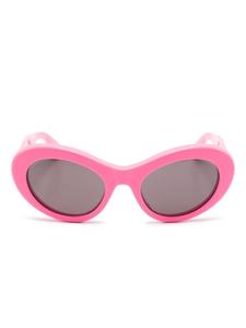 Balenciaga Eyewear солнцезащитные очки в круглой оправе с логотипом, розовый